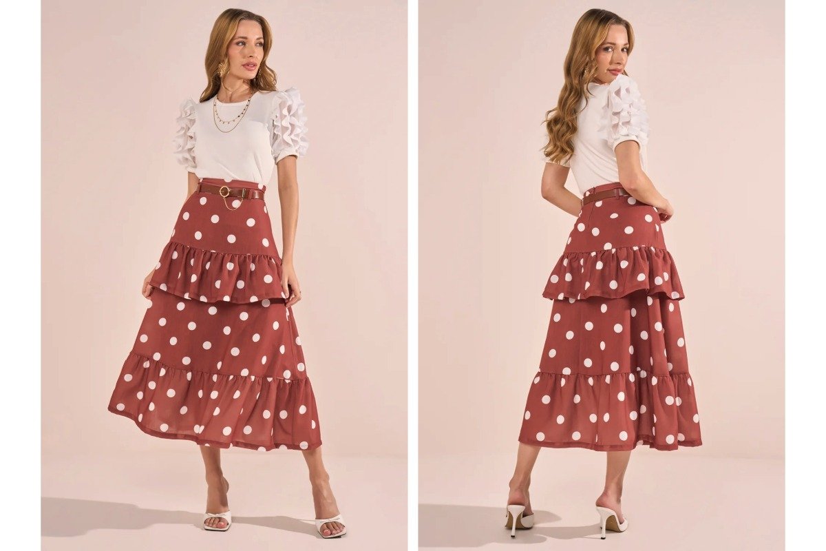 mulher usando blusa branca e saia marrom com estampa poa