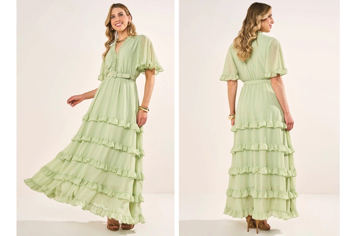 mulher com vestido longo verde com babados
