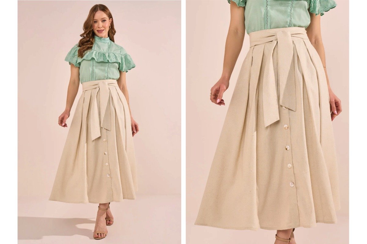 mulher usando camisa verde e saia midi bege