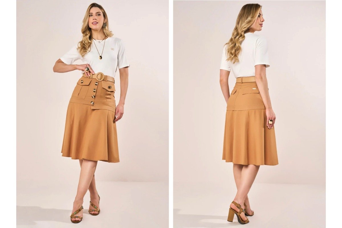 mulher usando camiseta branca e saia amarelo queimado