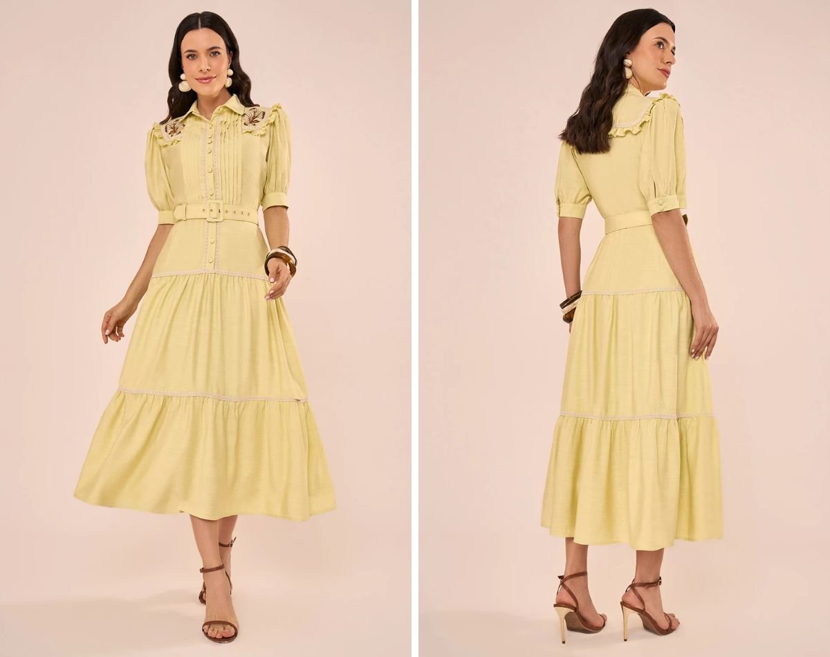 modelo com vestdo midi amarelo